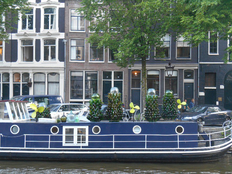 This houseboat has fancy landscaping