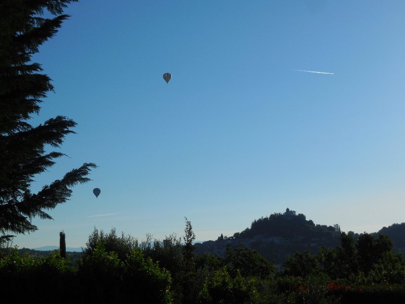 Hot air balloons plus jet over Forcalquier at 7am