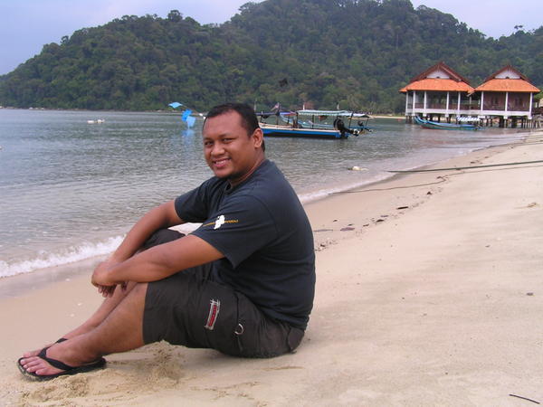 Sitting at Pantai Teluk Dlalam