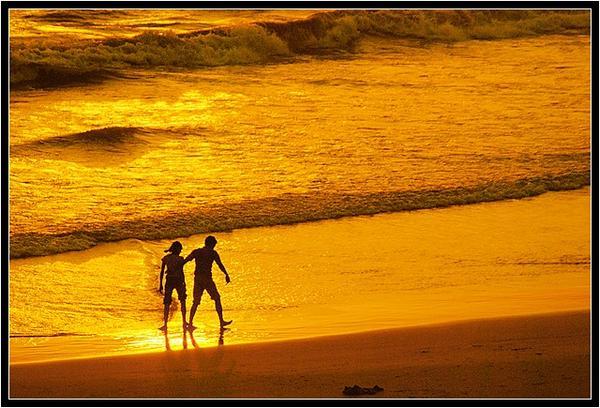 Sunset couple on Varkala beach