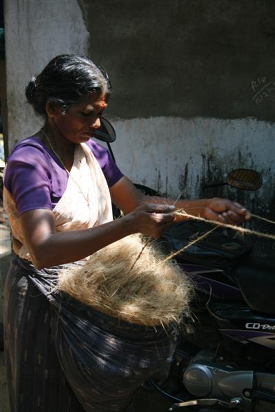 Woman making sissal rope