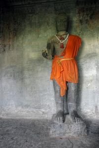statue inside of Angkor Wat