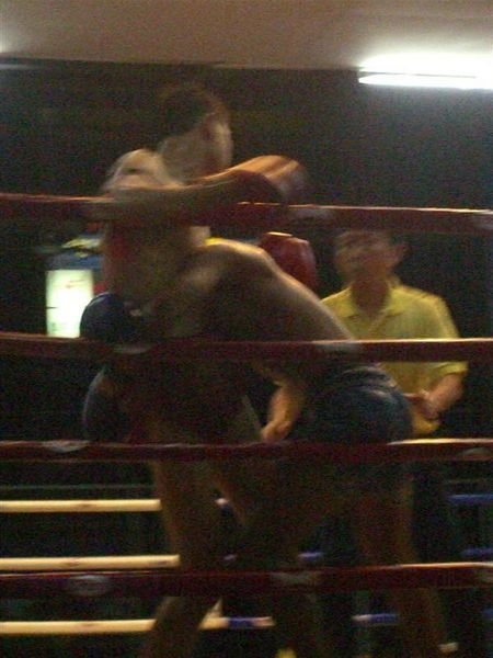muay thai fighters attempting to defeat each other with hugs... very violent hugs