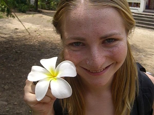 me with a plumeria flower