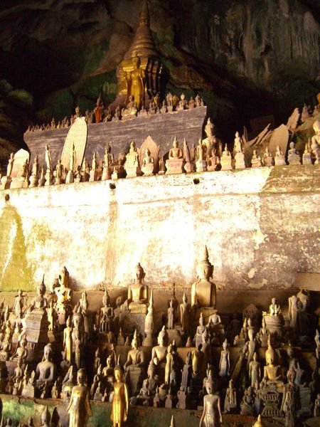 Buddha figurines inside Pak Ou