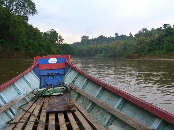 Lao flag on the front of a boat
