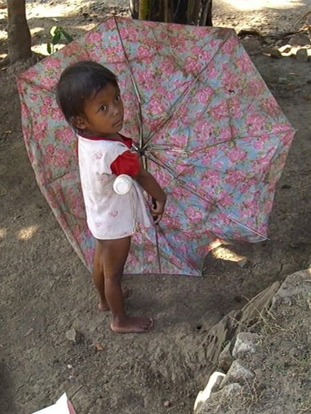 little girl with a pink umbrella