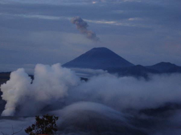 Mt. Semeru is further back, Bromo is the smokier one at the front