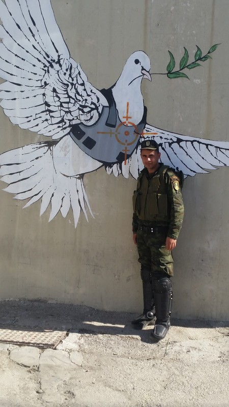 Banksy west bank with soldier
