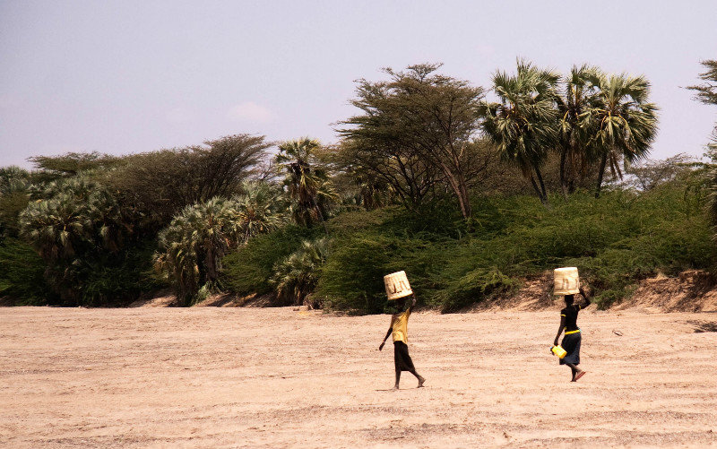 Turkana women carrying their famous woven baskents