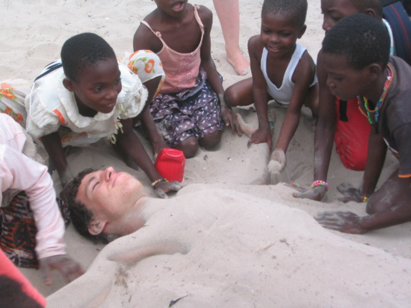 Burying Uncle Raphi in sand