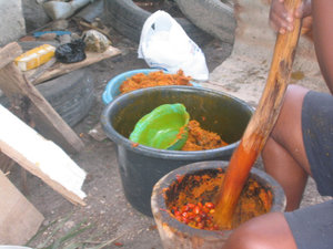 Preparing palm nut soup