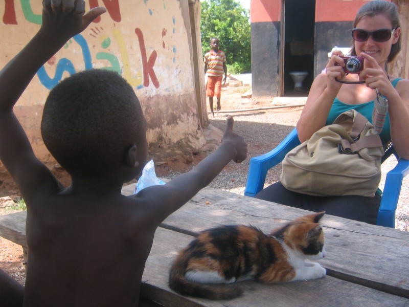 Agnes taking a photo of Ibi and Simba