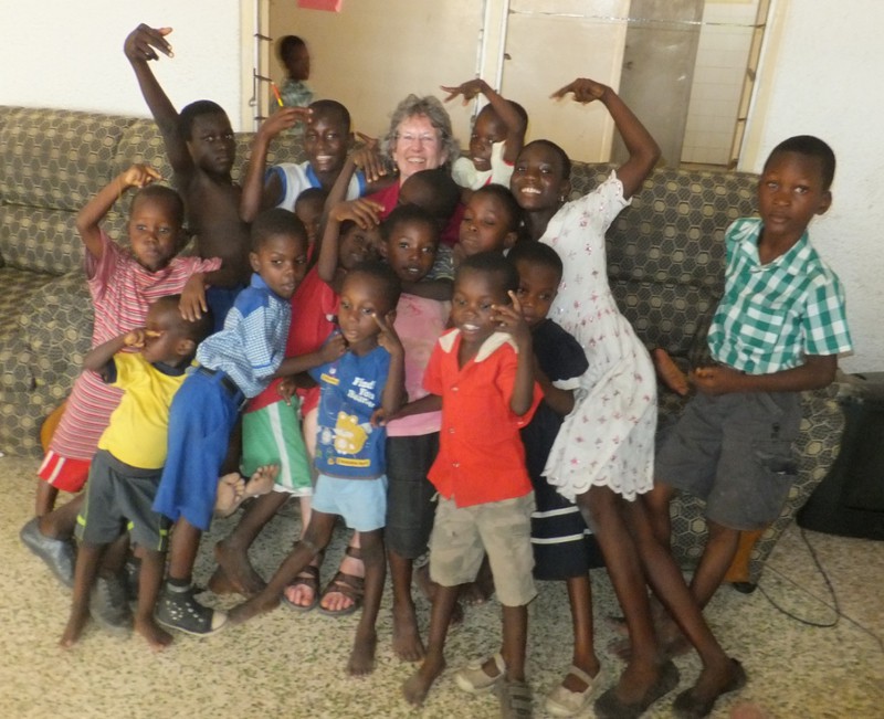 Kathy and kids at the orphanage