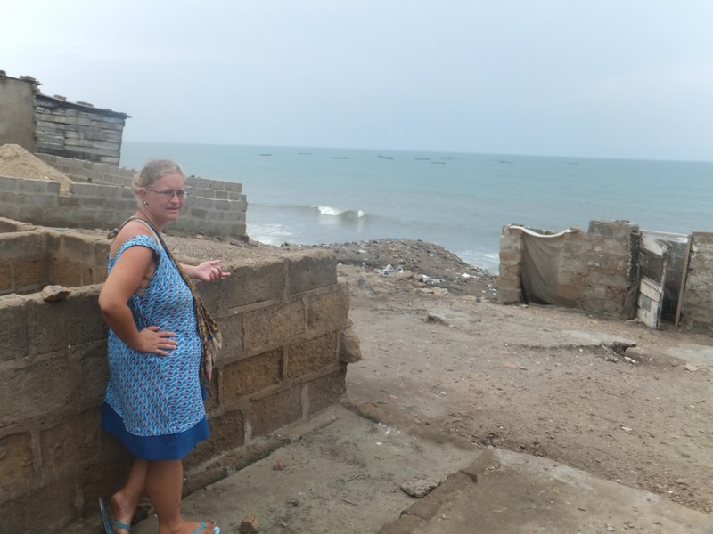 Laurel showing us where ne of th temporary clssrooms is set up at the fishing village