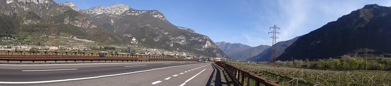 A22 towards Verona, Alps bounce out plain.