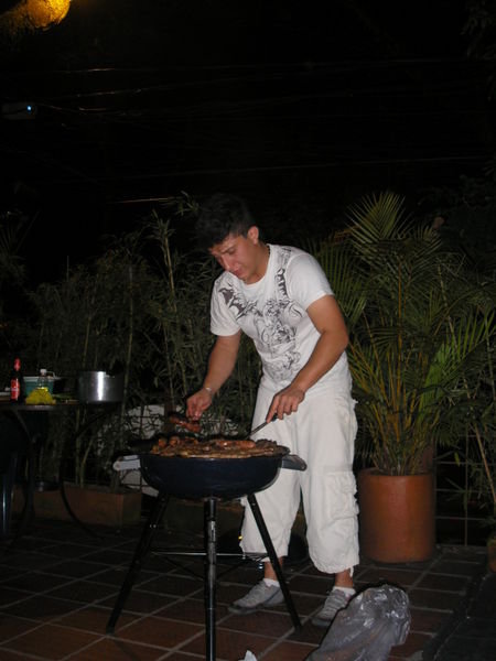 One of many cooks in Casa Kiwi Medellin