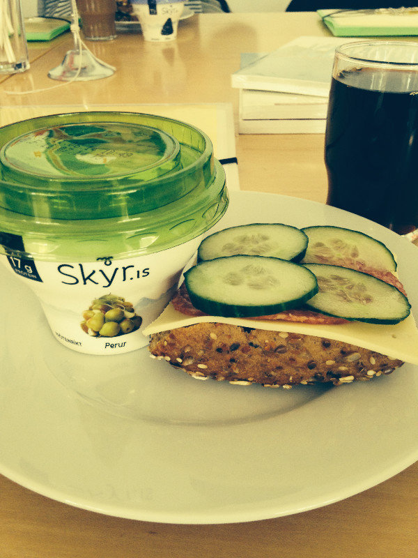 Icelandic Lunch - Whole-grain bread, meat, cheese and cucumber sandwich, Pear flavored Skyr and coffee.