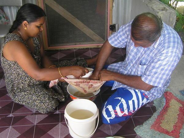 Nick's uncle and aunty making kava
