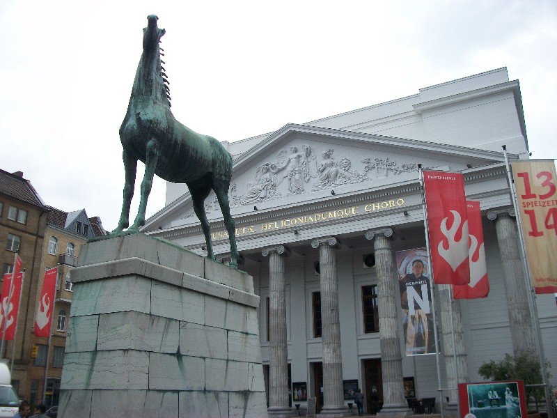 horse outside theater