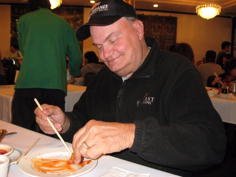 Steve's attempt to eat an egg roll with chopsticks--if all else fails, stab it!