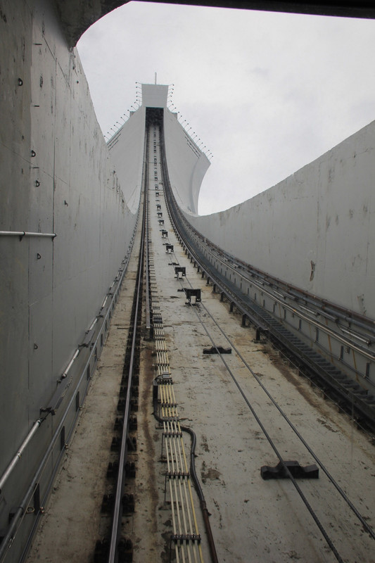 Funicular rail going up in leaning Olympic tower