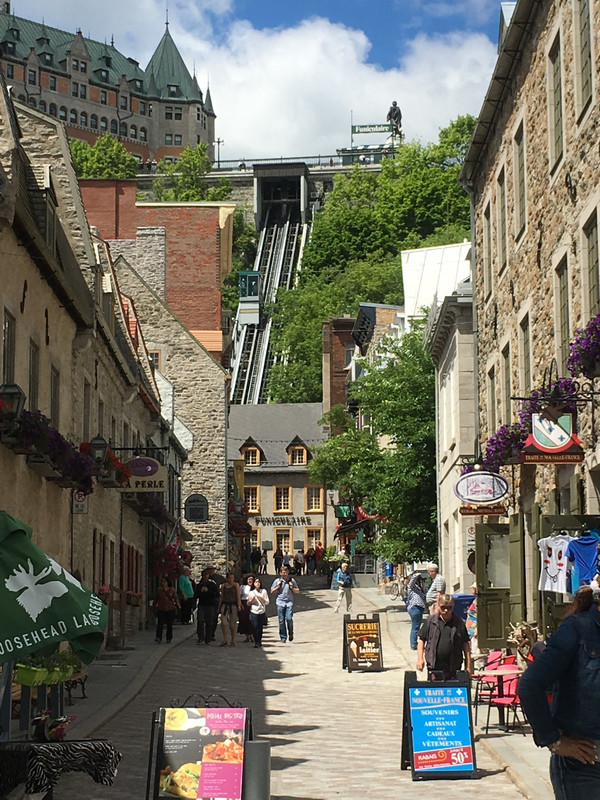 A view of the shops on the cobblestone streets, the Funiculaire, and Chateau Frontenac