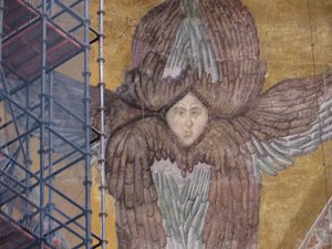 Winged Seraphim with face restored