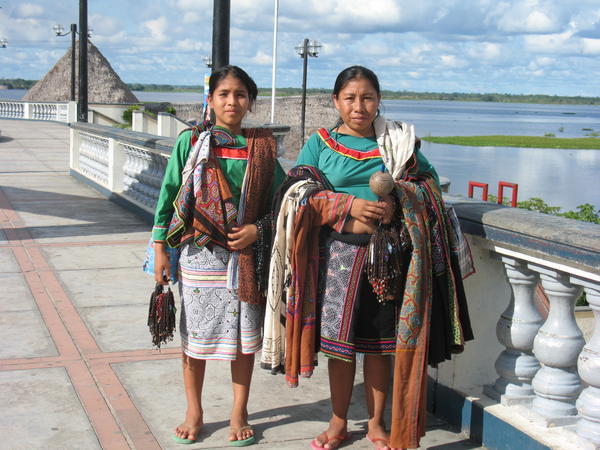 tribal weavers on bank of Amazon