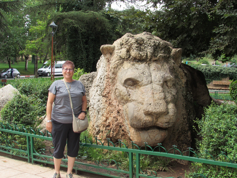 Susan with lion sculpture in Ifrane