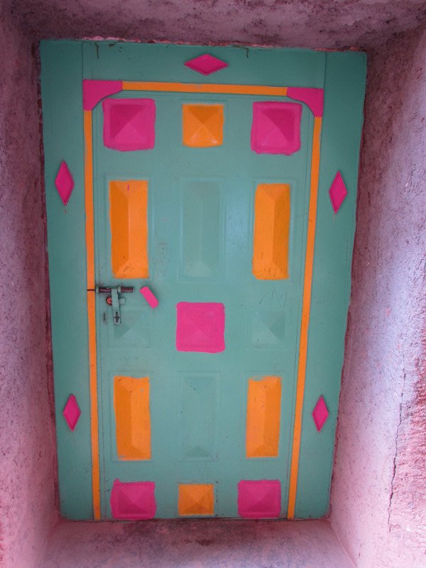 Brightly coloured door in the village