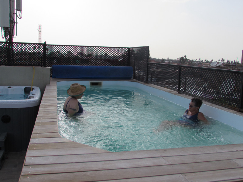Susan and Barb in the small rooftop terrace pool