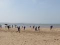 Soccer players on the beach