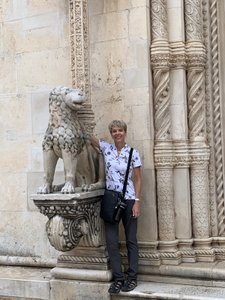 Me with lion statue in front of St. James Cathedral