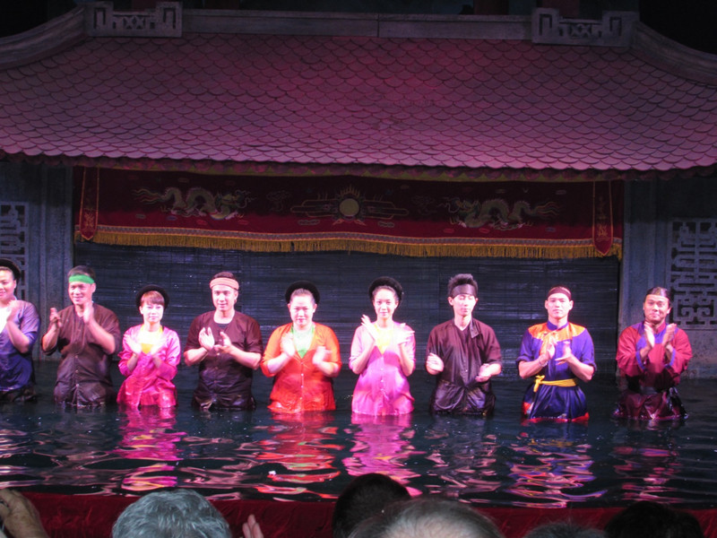 Water puppet show performers