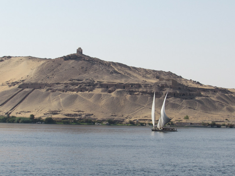 Felucca and tombs in the background 