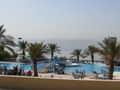 Pool and hazy Dead Sea behind