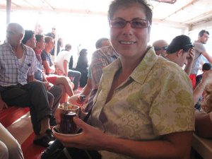 Susan with Turkish tea on the Bosphorus Cruise