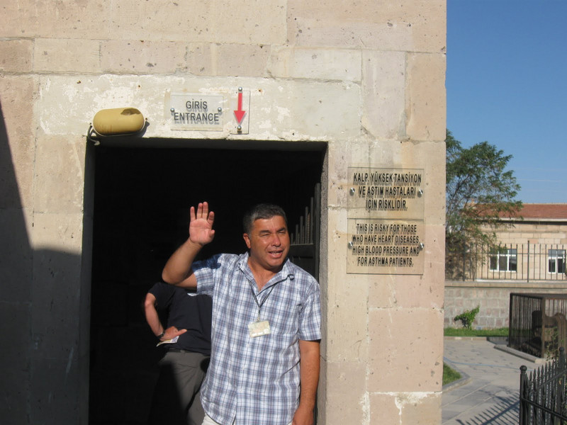 Nihat at the underground city entrance