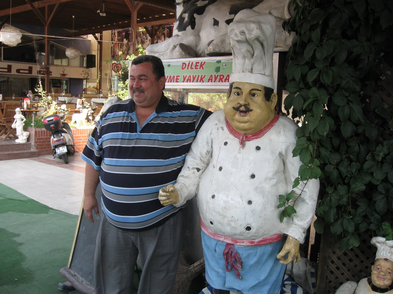 Mustafa - restaurant owner.