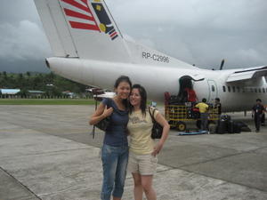 In Caticlan, in front of our small charter plane