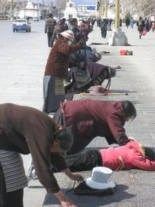 Prayer and prostration in front of the Potala