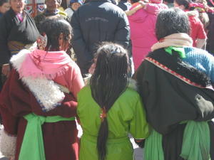  Women usually braid their hair in 108 braids, a sacred Tibetan number