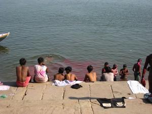 After Holi... people washing themselves at the Ganges