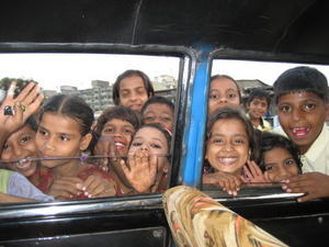 children saying bye as we leave