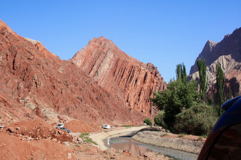 Red sandstone cliffs of Ghez Canyon