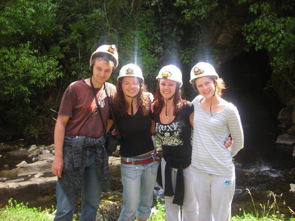 Outside the caves in Waitomo with our very attractive hats on...stylish