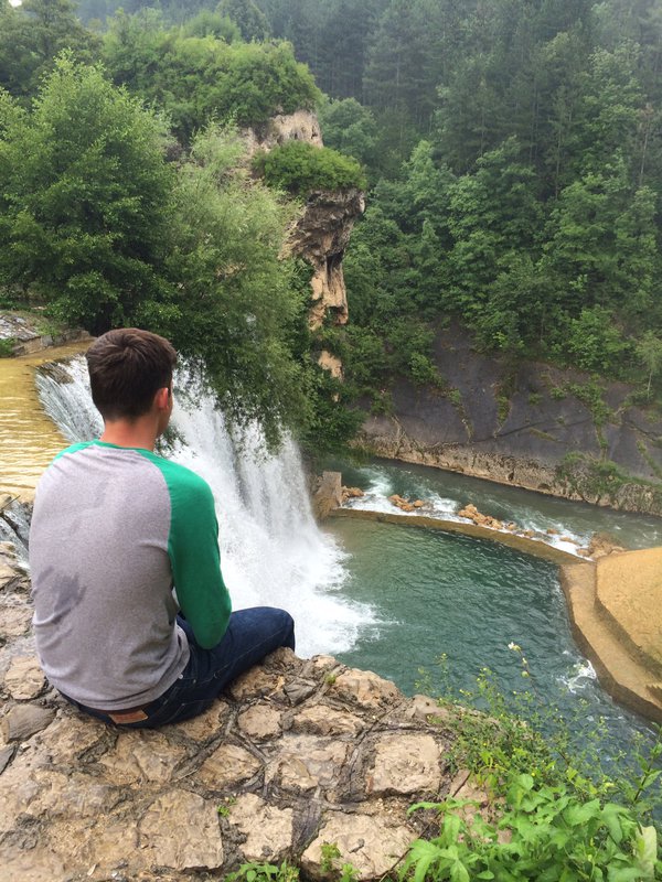 Joey looking pensive at the Jajca waterfall