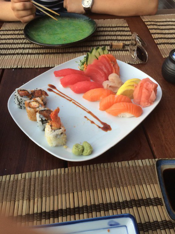 The partial remains of a sushi deluxe plate