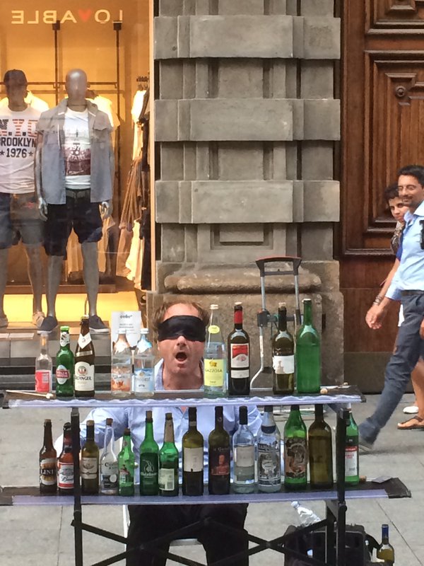 Blindfolded guy playing Eine Kleine Nachtmusik on bottles